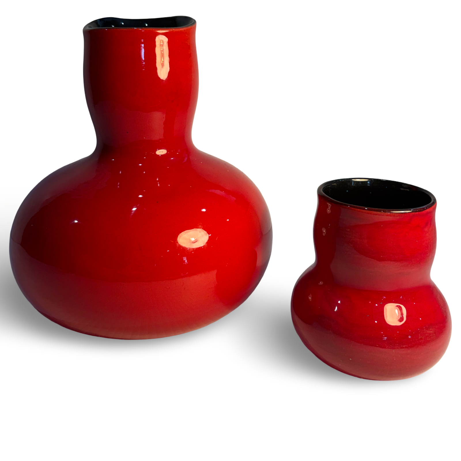 Unique red carafe and drinking vessel