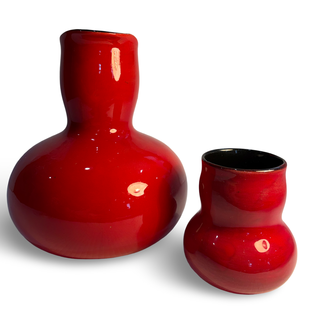 Unique red carafe and drinking vessel