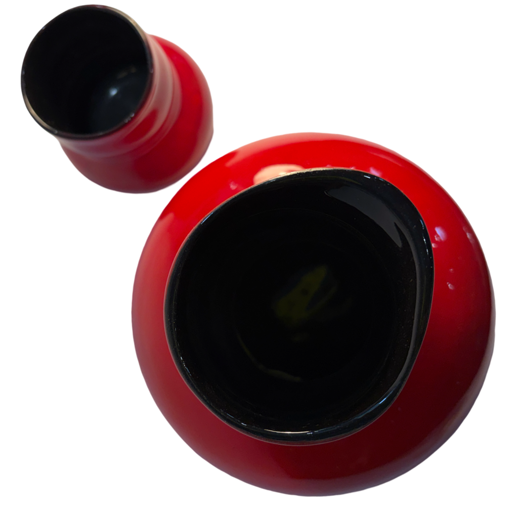 Unique red carafe and drinking vessel